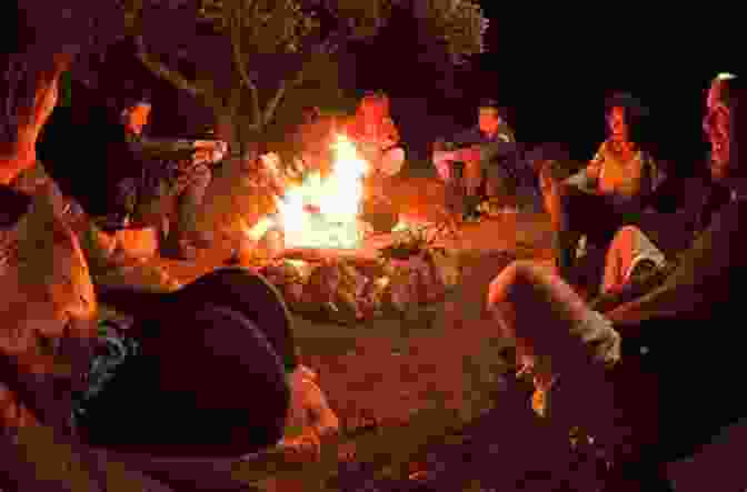 A Group Of Campers Gathered Around A Campfire, Gazing Up At The Starlit Sky With A Sense Of Tranquility And Connection With Nature Taming The Wild Margo Kaufman