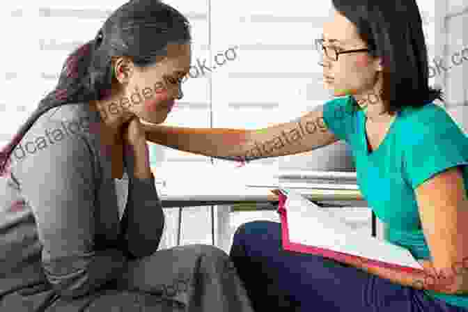 A Therapist And A Person Who Stutters Are Sitting And Talking In A Counseling Session. Effective Counseling In Stuttering Therapy
