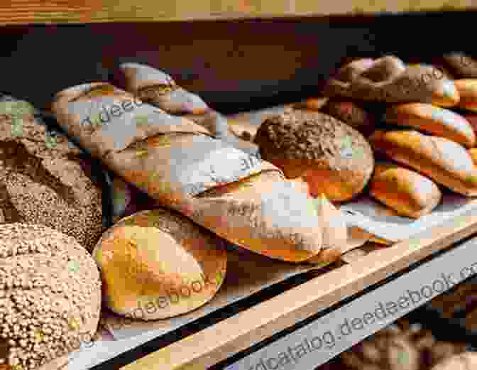 An Array Of Freshly Baked Breads Displayed On Wooden Shelves The Sunshine Crust Baking Factory