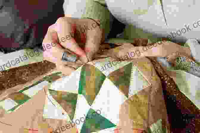 Close Up Of A Quilter's Hands Working On A Quilt Quilting Techniques For Beginners: Learn How To Quilt